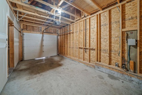 503-108 Armstrong Place, Canmore, AB - Indoor Photo Showing Garage