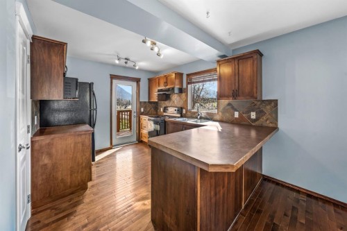 503-108 Armstrong Place, Canmore, AB - Indoor Photo Showing Kitchen With Double Sink
