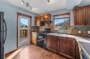 503-108 Armstrong Place, Canmore, AB  - Indoor Photo Showing Kitchen With Double Sink 