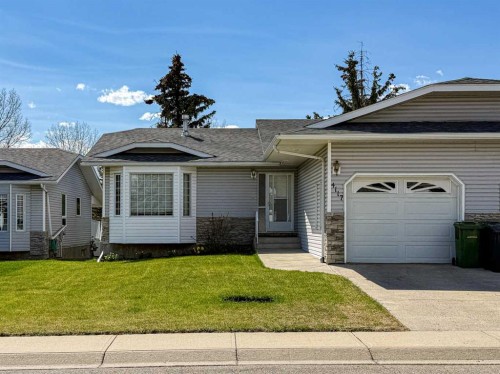 4117 Silverpark Estates Close, Olds, AB - Outdoor With Facade
