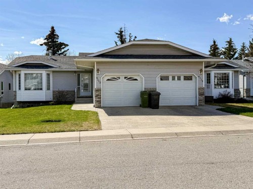 4117 Silverpark Estates Close, Olds, AB - Outdoor With Facade