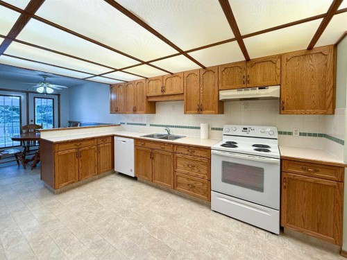 4117 Silverpark Estates Close, Olds, AB - Indoor Photo Showing Kitchen With Double Sink