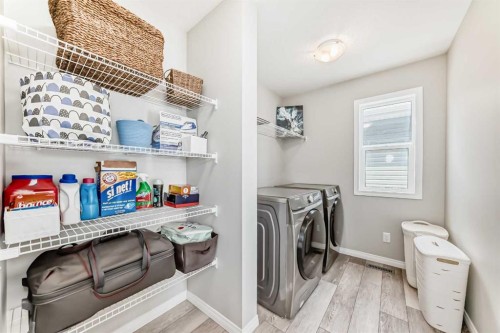 73 Lucas Heights Nw, Calgary, AB - Indoor Photo Showing Laundry Room