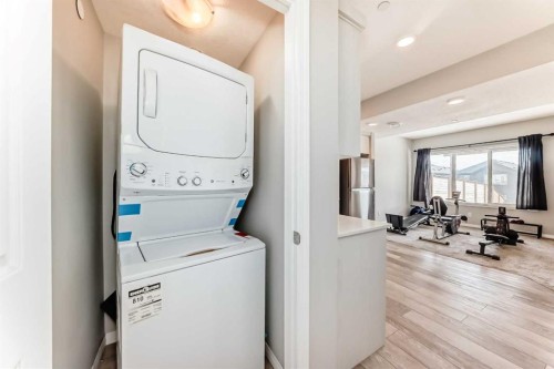 73 Lucas Heights Nw, Calgary, AB - Indoor Photo Showing Laundry Room