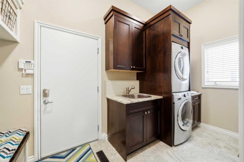 244 Cove Road, Chestermere, AB - Indoor Photo Showing Laundry Room