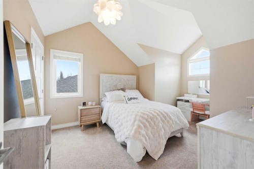 244 Cove Road, Chestermere, AB - Indoor Photo Showing Bedroom