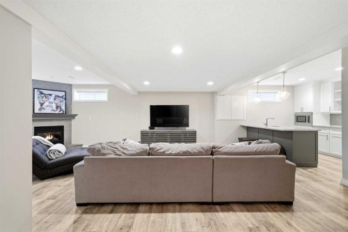 244 Cove Road, Chestermere, AB - Indoor With Fireplace