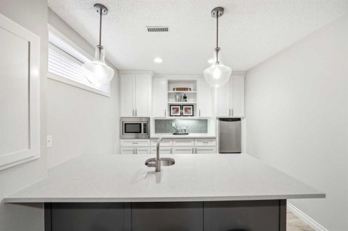 244 Cove Road, Chestermere, AB - Indoor Photo Showing Kitchen
