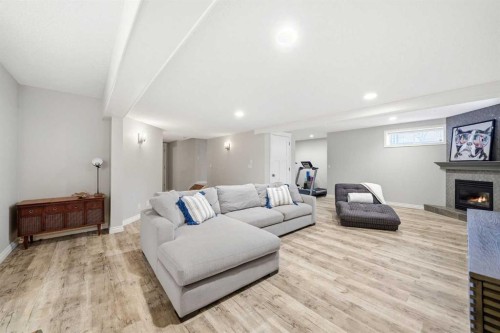 244 Cove Road, Chestermere, AB - Indoor With Fireplace