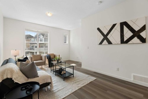 505 Copperstone Manor Se, Calgary, AB - Indoor Photo Showing Living Room