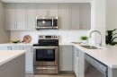 505 Copperstone Manor Se, Calgary, AB  - Indoor Photo Showing Kitchen With Stainless Steel Kitchen With Double Sink With Upgraded Kitchen 