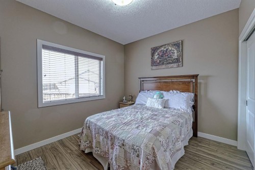 1936 High Park Circle Nw, High River, AB - Indoor Photo Showing Bedroom