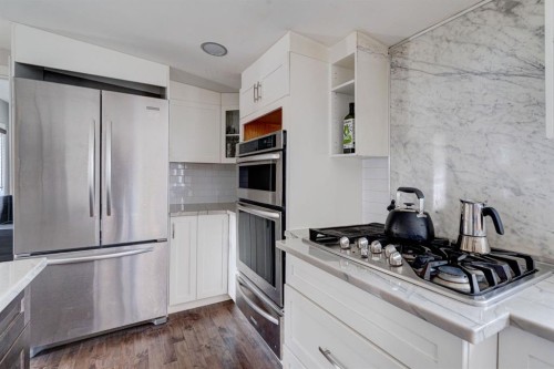 84 Burney, Bragg Creek, AB - Indoor Photo Showing Kitchen
