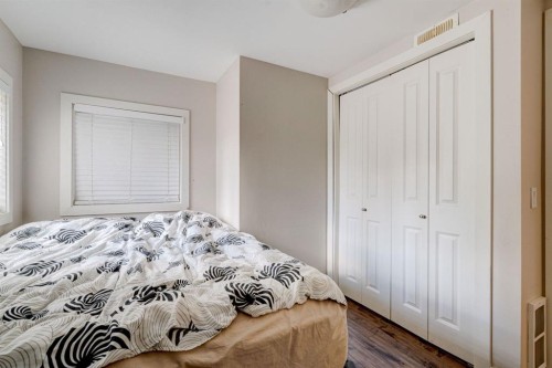 84 Burney, Bragg Creek, AB - Indoor Photo Showing Bedroom
