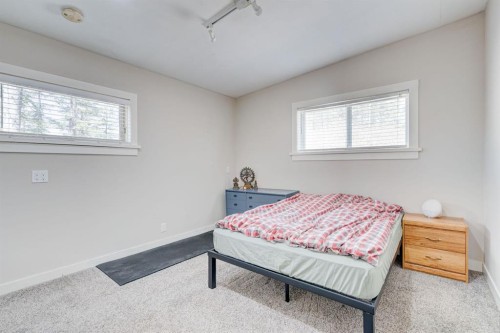 84 Burney, Bragg Creek, AB - Indoor Photo Showing Bedroom