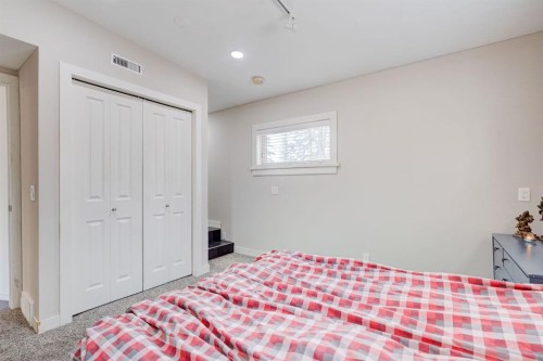 84 Burney, Bragg Creek, AB - Indoor Photo Showing Bedroom