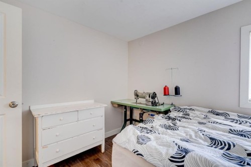 84 Burney, Bragg Creek, AB - Indoor Photo Showing Bedroom