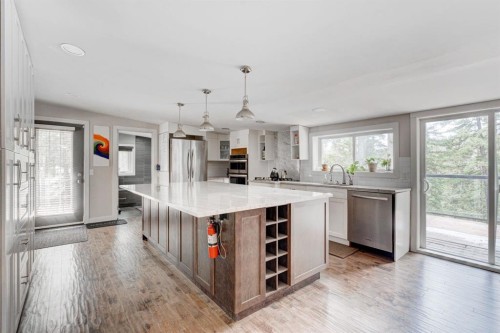 84 Burney, Bragg Creek, AB - Indoor Photo Showing Kitchen With Upgraded Kitchen