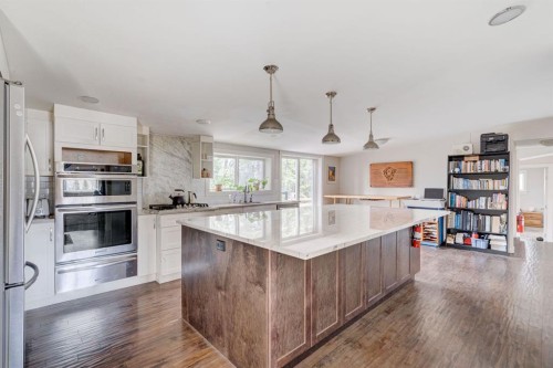 84 Burney, Bragg Creek, AB - Indoor Photo Showing Kitchen With Upgraded Kitchen