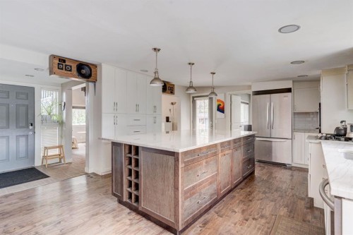 84 Burney, Bragg Creek, AB - Indoor Photo Showing Kitchen With Upgraded Kitchen