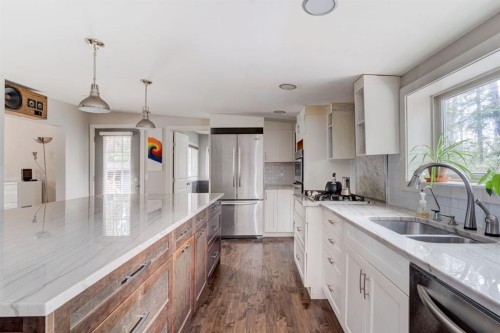 84 Burney, Bragg Creek, AB - Indoor Photo Showing Kitchen With Double Sink With Upgraded Kitchen