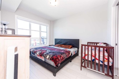 1317-681 Savanna Boulevard North, Calgary, AB - Indoor Photo Showing Bedroom