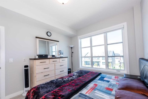 1317-681 Savanna Boulevard North, Calgary, AB - Indoor Photo Showing Bedroom