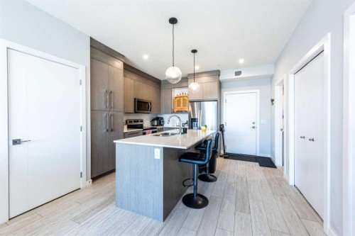 1317-681 Savanna Boulevard North, Calgary, AB - Indoor Photo Showing Kitchen