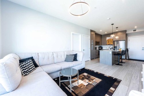 1317-681 Savanna Boulevard North, Calgary, AB - Indoor Photo Showing Living Room