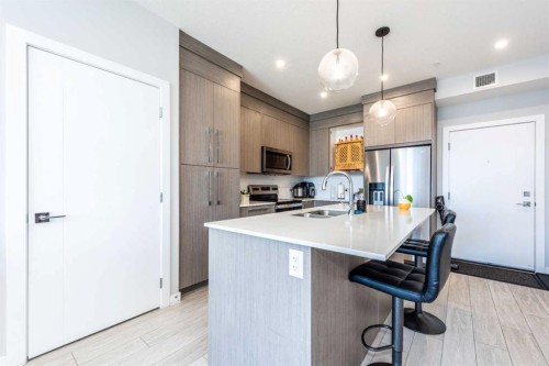 1317-681 Savanna Boulevard North, Calgary, AB - Indoor Photo Showing Kitchen