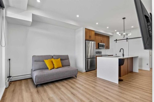 404-50 Sage Hill Walk Nw, Calgary, AB - Indoor Photo Showing Kitchen With Upgraded Kitchen