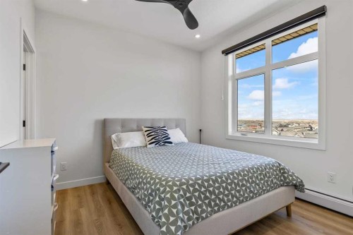 404-50 Sage Hill Walk Nw, Calgary, AB - Indoor Photo Showing Bedroom