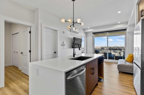 404-50 Sage Hill Walk Nw, Calgary, AB - Indoor Photo Showing Kitchen With Upgraded Kitchen