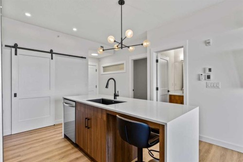 404-50 Sage Hill Walk Nw, Calgary, AB - Indoor Photo Showing Kitchen With Upgraded Kitchen