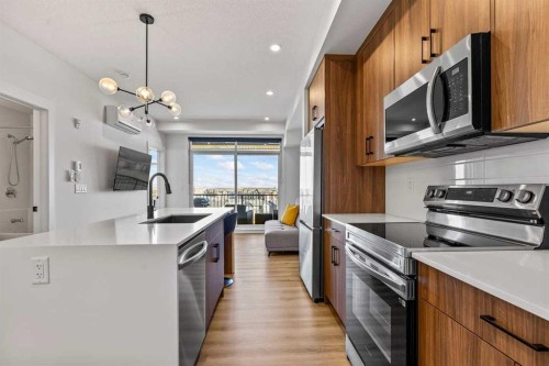 404-50 Sage Hill Walk Nw, Calgary, AB - Indoor Photo Showing Kitchen With Upgraded Kitchen