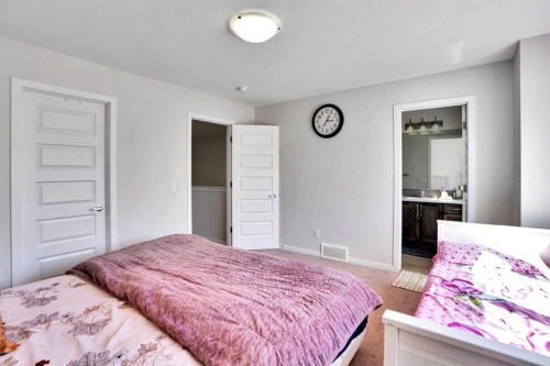 60 Cityside Grove Ne, Calgary, AB - Indoor Photo Showing Bedroom