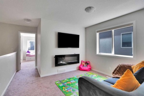 60 Cityside Grove Ne, Calgary, AB - Indoor Photo Showing Living Room With Fireplace