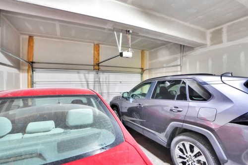 60 Cityside Grove Ne, Calgary, AB - Indoor Photo Showing Garage