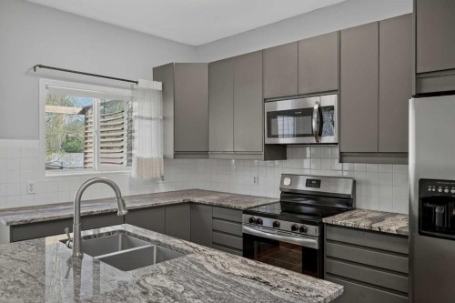 36 Chaparral Drive, Calgary, AB - Indoor Photo Showing Kitchen With Double Sink With Upgraded Kitchen