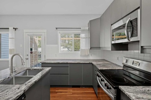 36 Chaparral Drive, Calgary, AB - Indoor Photo Showing Kitchen With Double Sink With Upgraded Kitchen