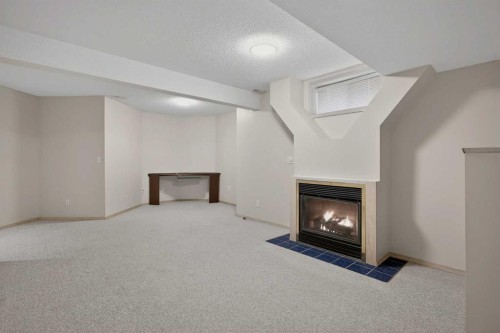 36 Chaparral Drive, Calgary, AB - Indoor With Fireplace