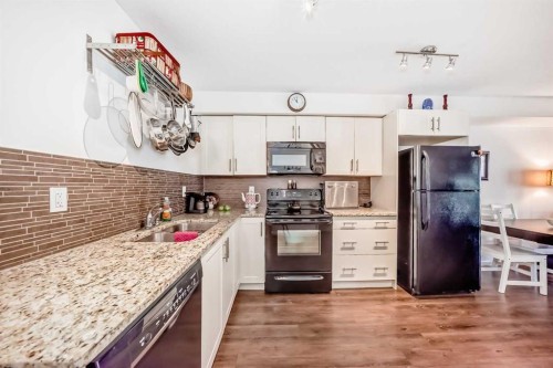 6315-755 Copperpond Boulevard Se, Calgary, AB - Indoor Photo Showing Kitchen With Double Sink