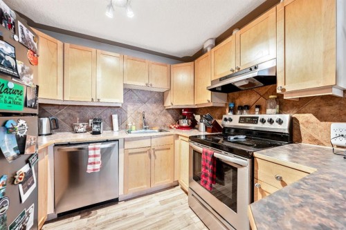 4-310 22 Avenue Sw, Calgary, AB - Indoor Photo Showing Kitchen With Stainless Steel Kitchen