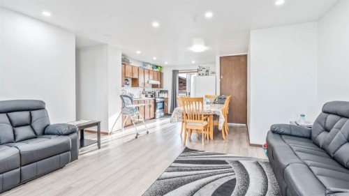 379 Maitland Crescent Ne, Calgary, AB - Indoor Photo Showing Living Room
