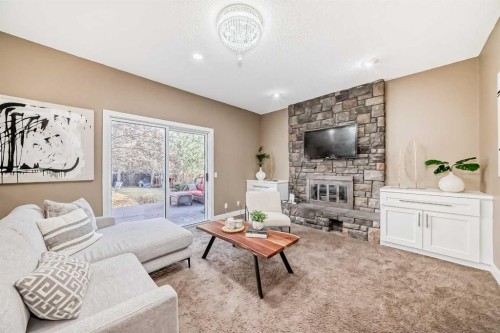 36 Varsity Estates Court Nw, Calgary, AB - Indoor Photo Showing Living Room With Fireplace