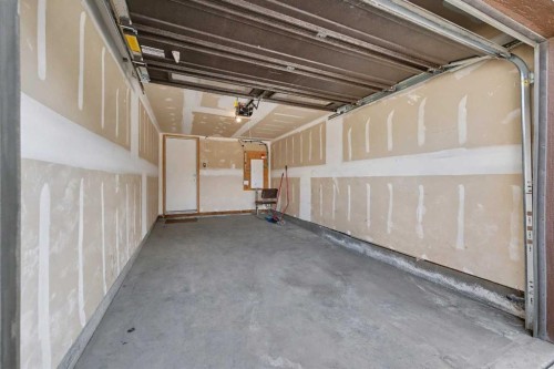 117 Livingston Common Ne, Calgary, AB - Indoor Photo Showing Garage