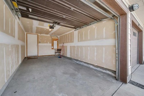 117 Livingston Common Ne, Calgary, AB - Indoor Photo Showing Garage