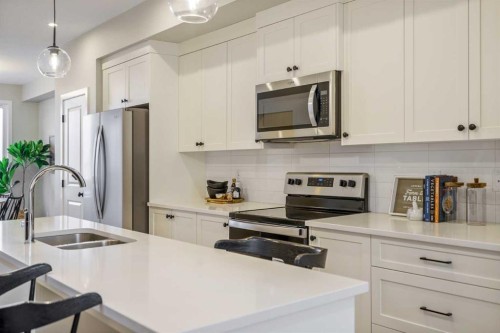 1449 Rangeview Drive Se, Calgary, AB - Indoor Photo Showing Kitchen With Double Sink With Upgraded Kitchen