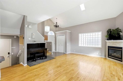45 Patterson Hill Sw, Calgary, AB - Indoor Photo Showing Living Room With Fireplace