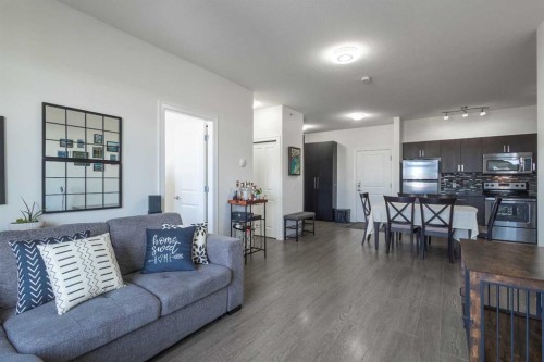 403-117 Copperpond Common Se, Calgary, AB - Indoor Photo Showing Living Room